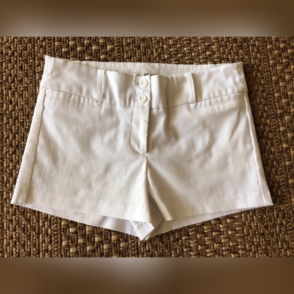 white polyester shorts